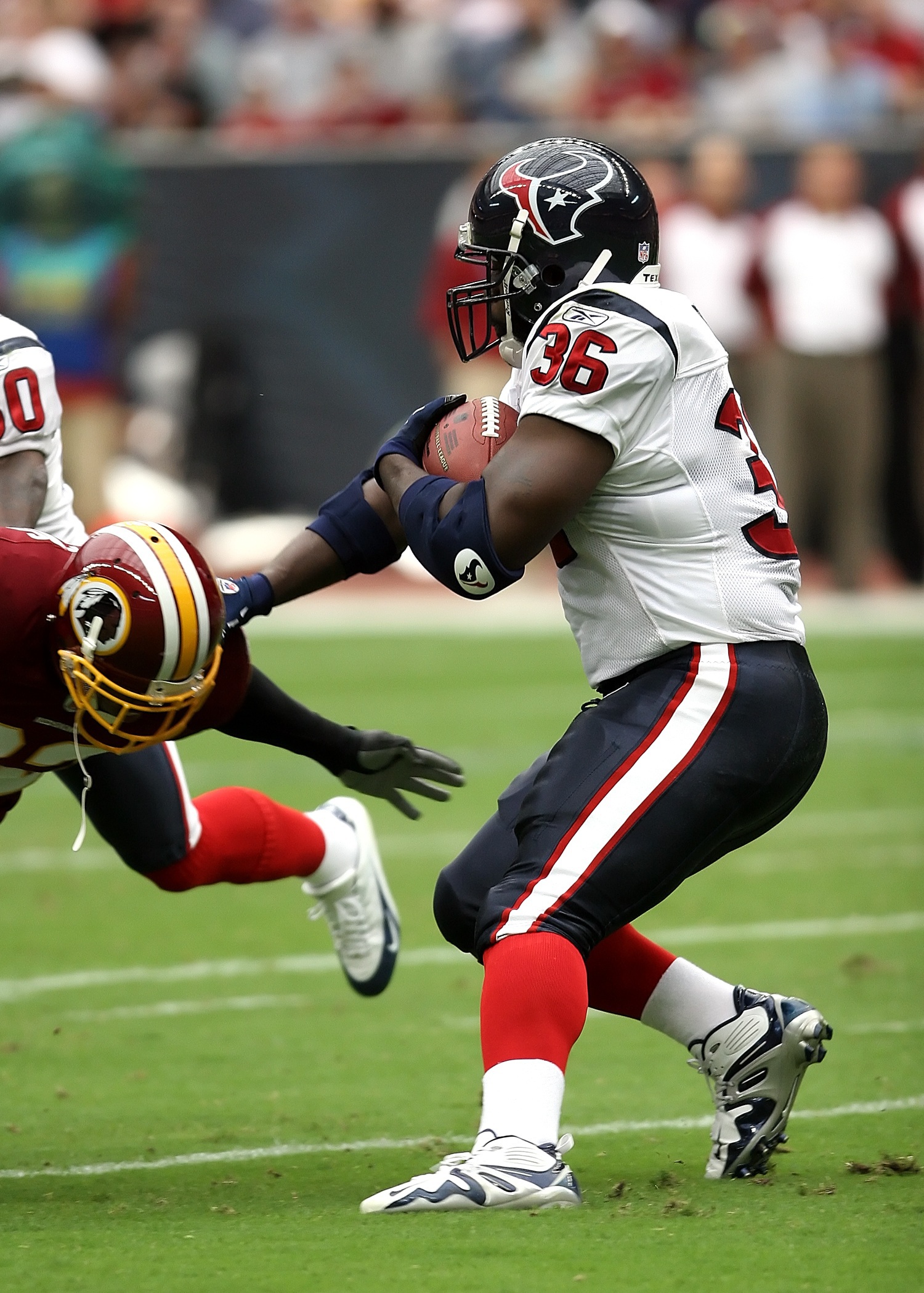 Running back Breaking a tackle.